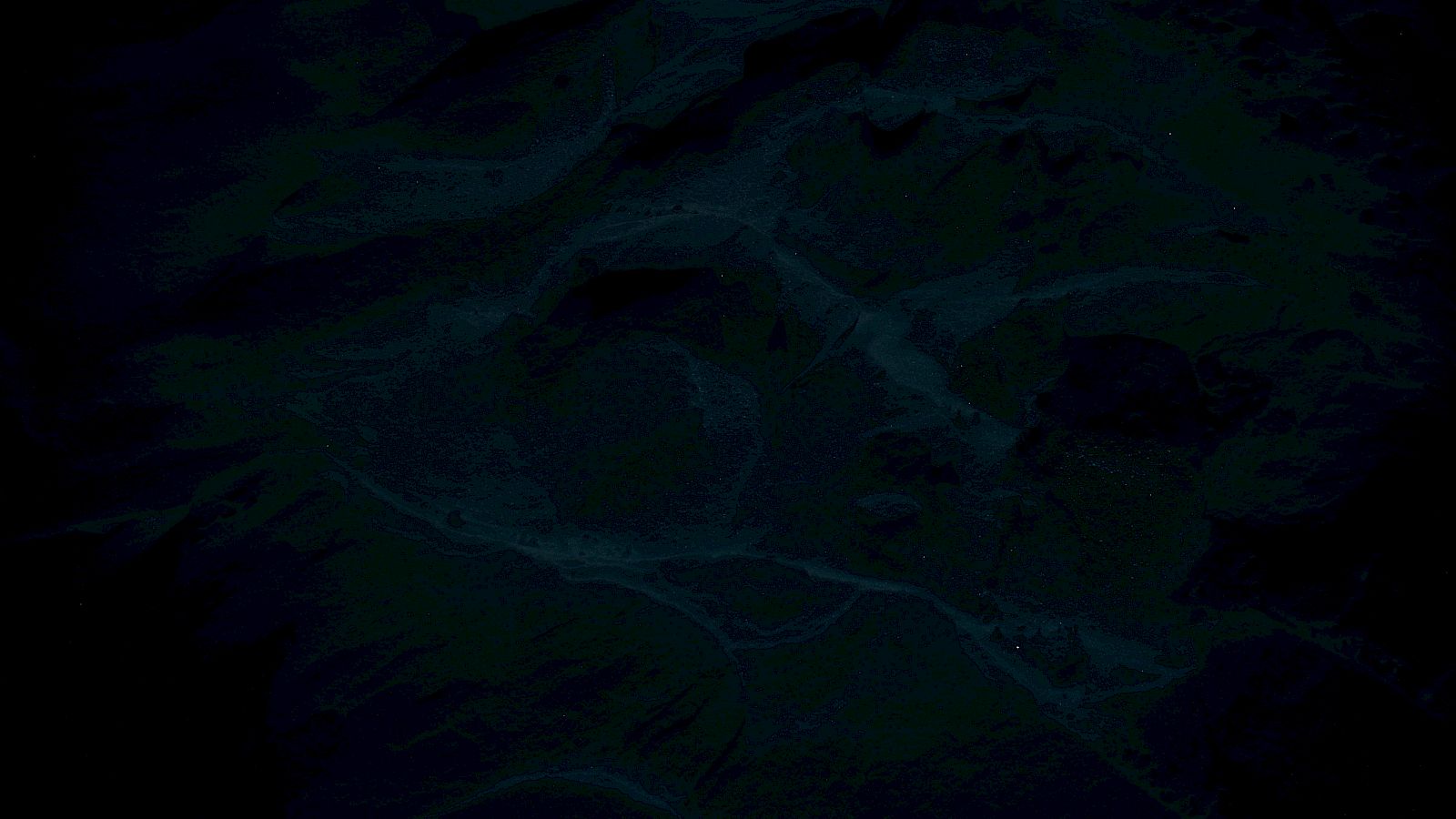 This image appears to be very dark, making it difficult to discern specific details or objects within it clearly.