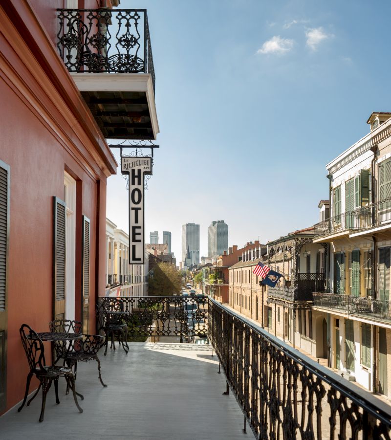 A balcony with a view of the city
